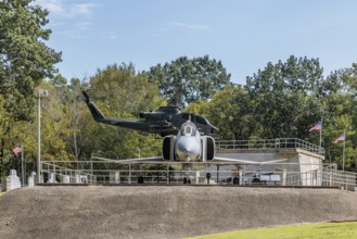 Captain Ed Yeilding's f4 Phantom aircraft and an Apache heilcopter on display at the Veterans