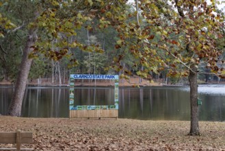 Permanent painte wooden photo prop beside Lake Ivy at Clarko State Park near Quitman, Mississippi,