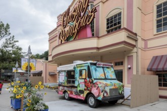 Blended Pedaler food truck parked at the entrance of the closed Chasing Rainbows theater at the