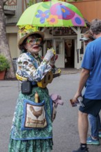 Miss Lillian, The Chicken Lady entertaining guests at the Dollywood amusement park in Pigeon Forge,