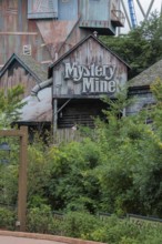 Sign on the building near the entrance to the Mystery Mine roller coaster ride at the Dollywood