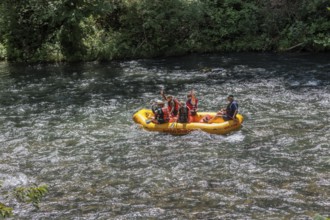Rafters on the Nantahala River as seen from the Great Smoky Mountains Railroad which runs next to