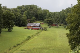 Small family farm in the mountains as seen from the open air car of the Great Smoky Mountains