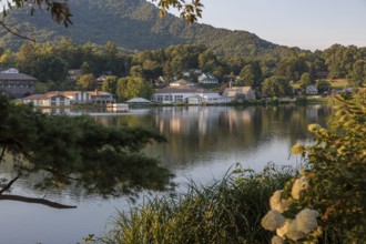 Private homes, Stuart Auditorium, and the Memorial Chapel across the lake at Lake Junaluska, North