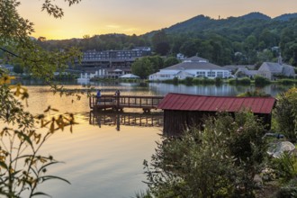 Men on the Lake Junaluska Meditation and Fishing pier at sunset in Lake Junaluska, North Carolina
