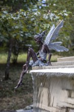 Fairy sculpture on a stone fountain near the entrance to Dismals Canyon near Phil Campbell,