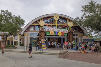 Shoppers and visitors walking past the Once Upon A Toy toy store in Downtown Disney at Disney World