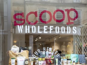 Scoop Wholefoods shop store window, Green Street, city of Bath, north east Somerset, England, UK