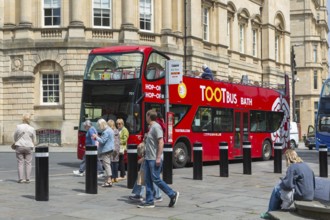 Tootbus Bath open top double-decker tour bus, High Street, city of Bath, north east Somerset,