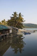 Sandy beach beach with coconut palms, Ao Phrao Beach, sunset, Koh Kood, Koh Kut, Gulf of Thailand,