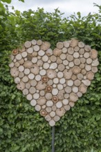 Wooden heart made from wooden boards, Münsterland, North Rhine-Westphalia, Germany