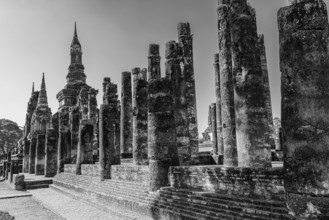 Historic Buddhist temple complex Wat Mahathat, historical park, black and white photo, Sukhothai,