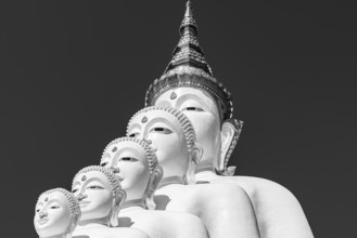 Five-headed Buddha statue, black and white photo, Wat Phra That Sorn Kaew Buddhist temple complex,