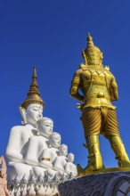 Five-headed Buddha statue with a gilded temple guard in front of it, Wat Phra That Sorn Kaew
