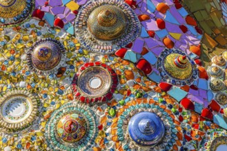 Wall covering with colorful mosaic tiles and incorporated bowls, Buddhist temple complex Wat Phra