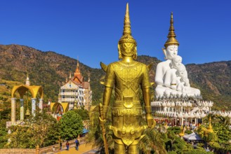 Wat Phra That Sorn Kaew Buddhist temple complex with five-headed Buddha statue, bell tower and