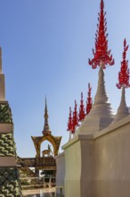 Red decorated tops of a temple complex, Buddhist temple complex Wat Phra That Sorn Kaew, Phetchabun