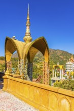 Round arch pavilion decorated with colorful mosaics and glass works of art, Wat Phra That Sorn Kaew
