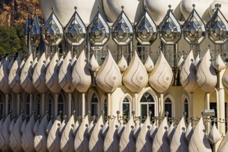 Richly decorated pedestal structure of the five-headed Buddha statue, Wat Phra That Sorn Kaew