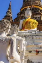 Stone Buddha statues, historic Buddhist temple complex, Ayutthaya, Thailand