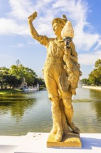 Stone male figure in alpine traditional costume, Thai King's summer palace, Bang Pa-In, near