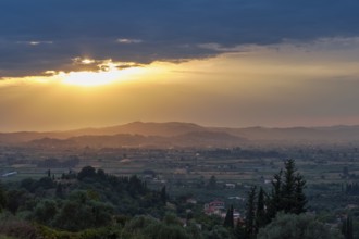 Panoramic view of a peaceful landscape at sunset with lush vegetation, Hotel Europa, garden