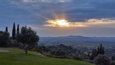 View of a quiet landscape with illuminated sky and vegetation at dusk, Hotel Europa, garden