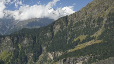 Dramatic landscape with high mountains on the Manali-Leh Highway and passing clouds, trekking