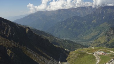 Wide mountain landscape with valleys under a cloudy sky, trekking in Ladakh, Manali-Leh Highway,