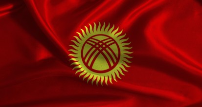 National flag of Kyrgyzstan with cloth texture. Kyrgyz flag with realistic texture background