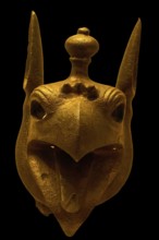 Bronze griffin protome, golden sculpture of a mystical animal head with detailed features, Olympia