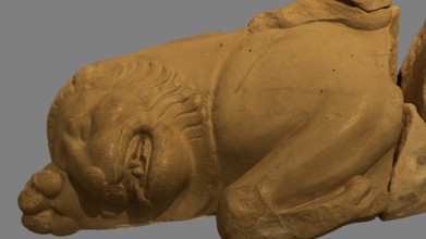Killed Nemean lion, statue detail of a lying lion, stone texture and fine details, Olympia