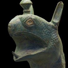 Bronze griffin protome, green-brown bronze depiction of an imaginary being with fine scale