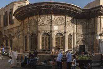 Cairo, Egypt. July 7th 2024 A local vegetable market in front of the ancient Sabil of Muhammad Ali