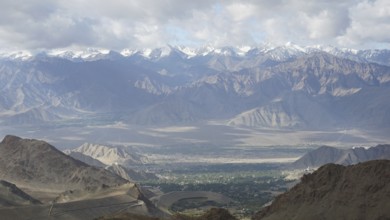 Majestic mountains with snowy peaks under a cloudy sky, Nubra Valley, trekking in Ladakh,