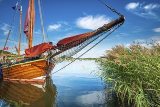 Traditional wooden sailboat in the harbor on the ferry of Moritzdorf, OT of Sellin, Mönchgut