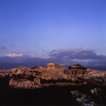 Acropolis, general view from south, sunset with dark clouds, Athens, Greece