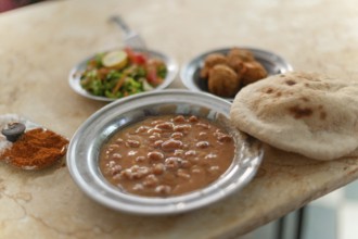 Cairo, Egypt. April 10th 2018 Mashed fava beans known as Fuul, Traditional Egyptian street food,