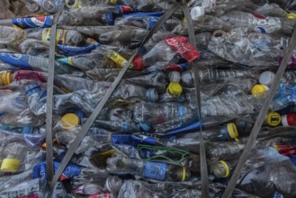 Cairo, Egypt. November 26th 2022 Compressed stack of plastic bottles collected by local fishermen