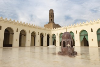 Cairo, Egypt, November 26th 2022 Minaret and ablutions fountain of historic Mosque of al-Hakim,