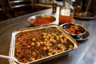 Koshary, kushari or koshari the most popular culinary dish in Egypt, a mix of pasta, rice, lentils,