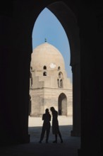 Cairo, Egypt. November 29th 2022 Tourists inside the courtyard and dome of Ibn Tulin Mosque in