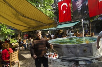 Bursa, Turkey. April 21st 2014 Turkish tea being served in an outdoor cafe, Bursa City, Turkey