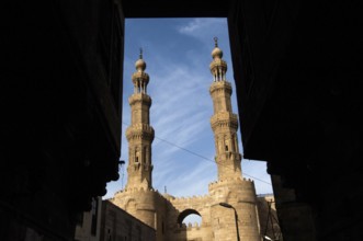Bab Zuweila is one of three remaining gates in the walls of the Old City of Cairo, the capital of