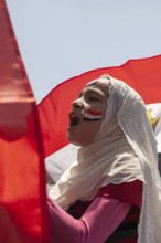 Cairo, Egypt. July 22nd 2011 Young Egyptian girl chanting slogans at an anti-government protest in