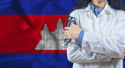 Healthcare professional with Cambodia flag background. Professional doctor holding stethoscope on