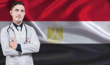 Portrait of medical professional on Egypt flag background. Egyptian national health system