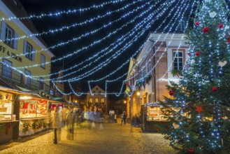 Christmas market, night view, Riquewihr, Grand Est, Haut-Rhin, Alsace, France