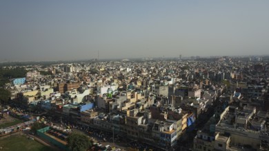 Far-reaching view of an Indian cityscape, Delhi under clear sky, Delhi, India