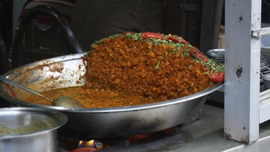 Large pan of Indian curry dish being cooked, Manali, Himachal Pradesh, India